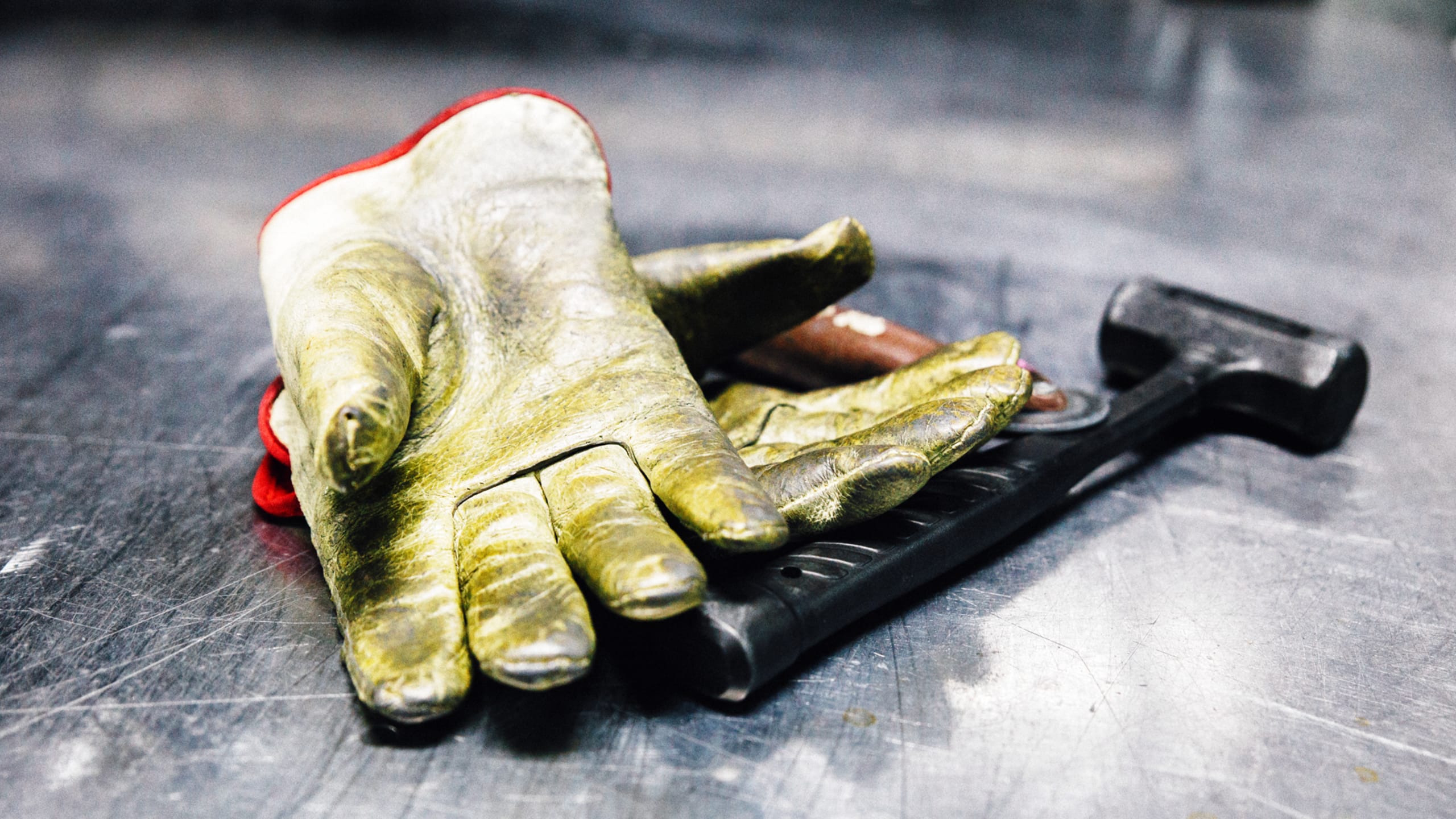 A bicycle builder's glove and frame-building tool in the Trek workshop